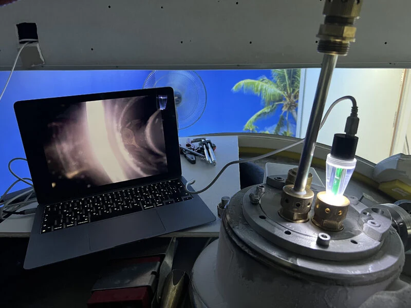 Camera-guided inspection and controlled access during MRI magnet de-icing.