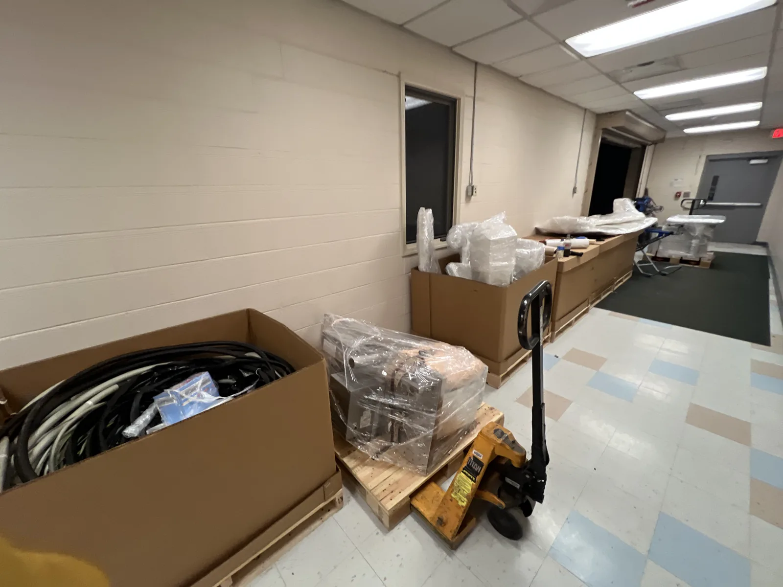 Organized MRI cables and protected components prepared for removal.