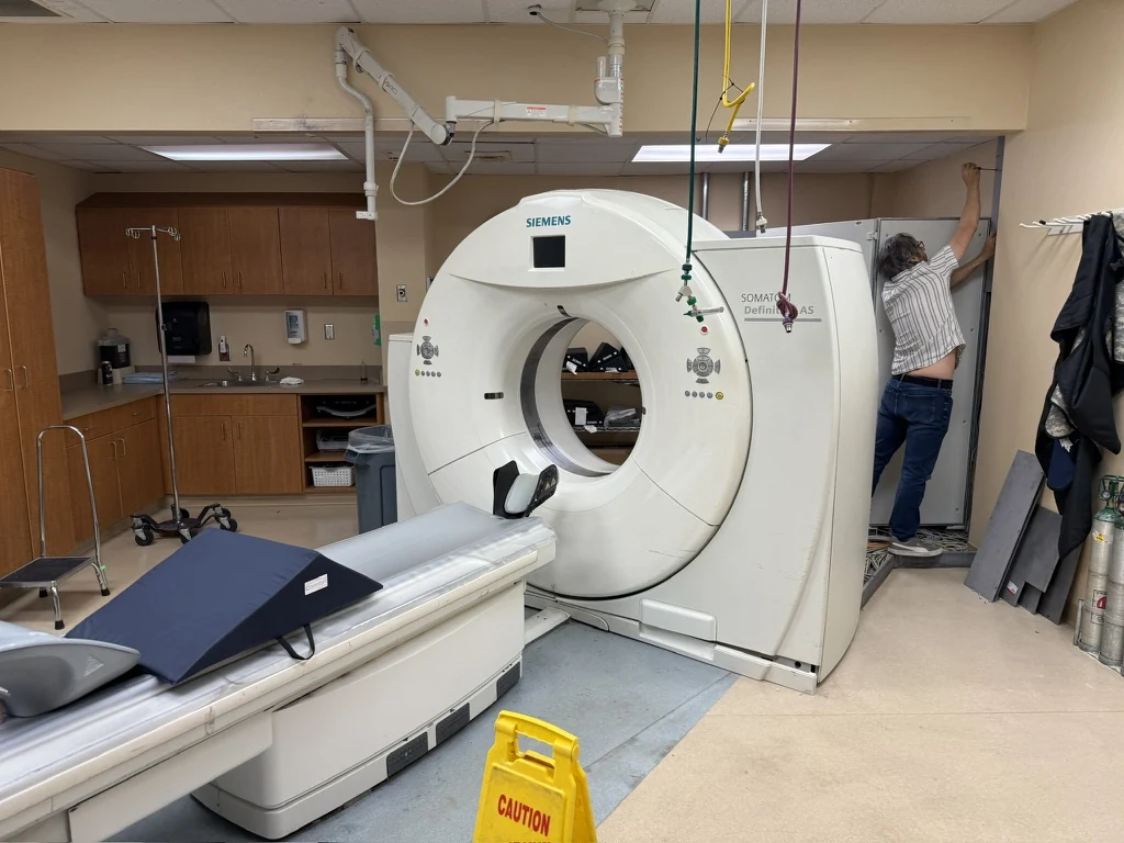 Siemens CT gantry and patient table inside the scan room during preparation for deinstallation in Rome, Georgia.