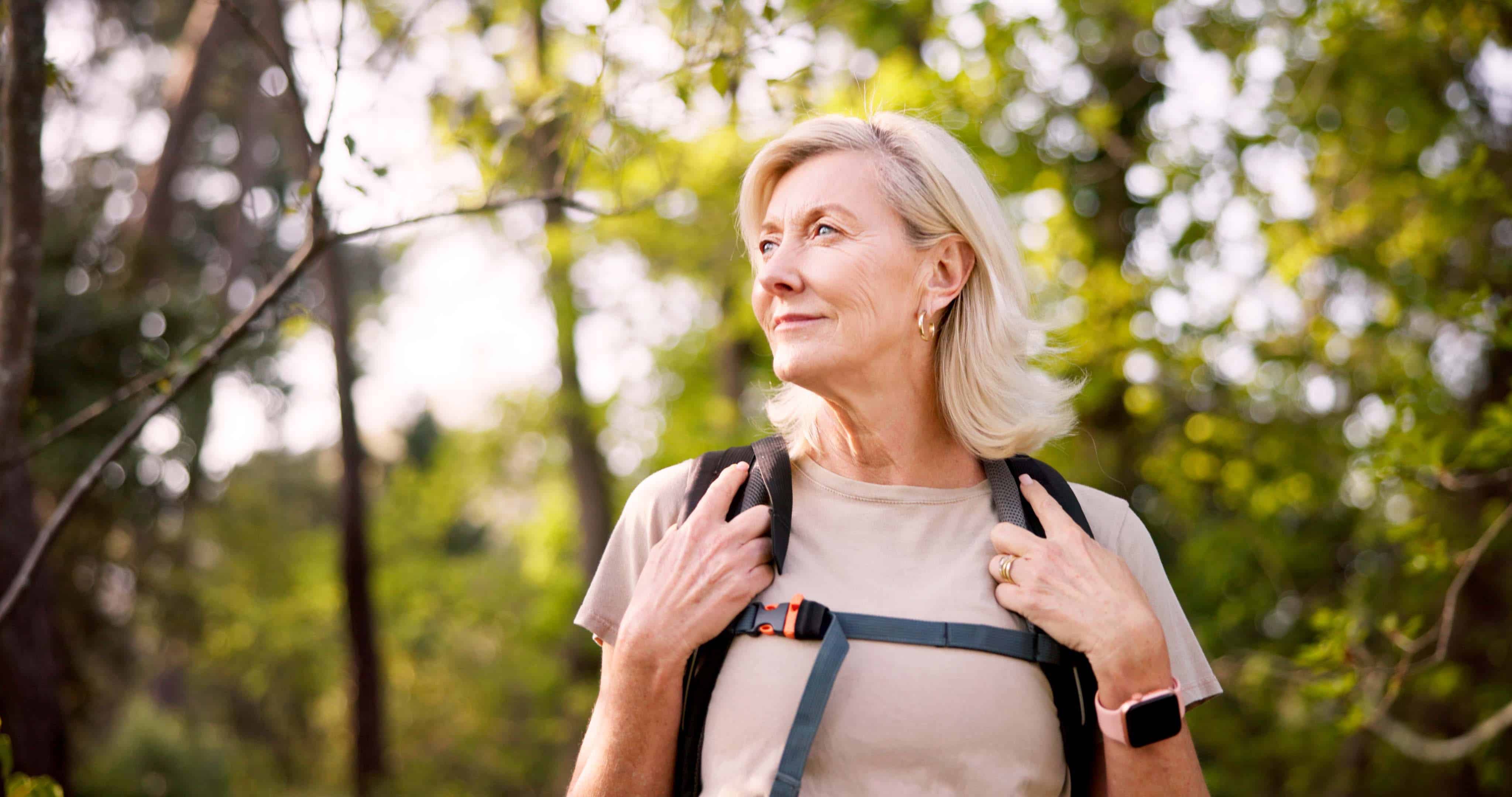 woman doing a weighted walk 
