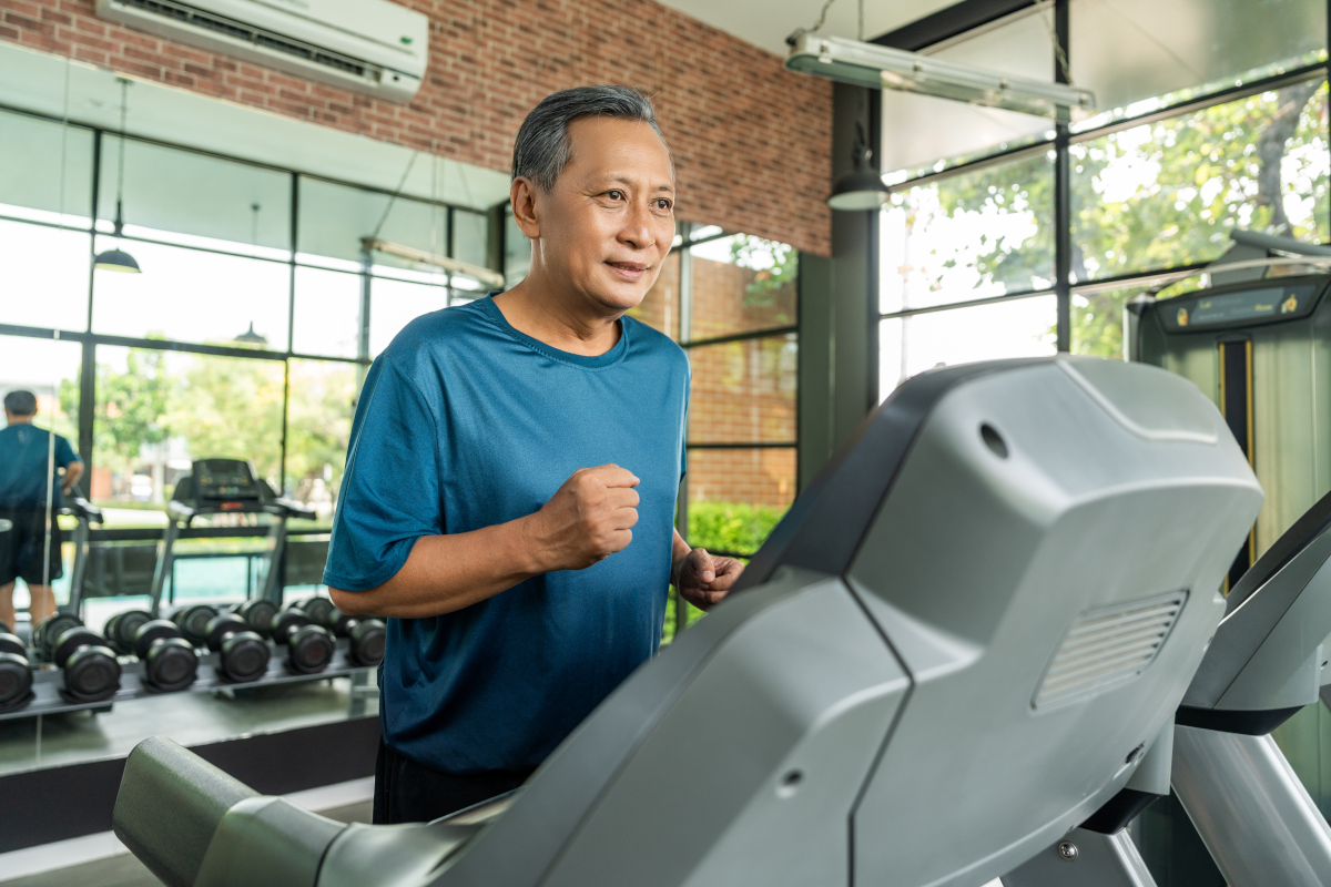 man running on treadmill 