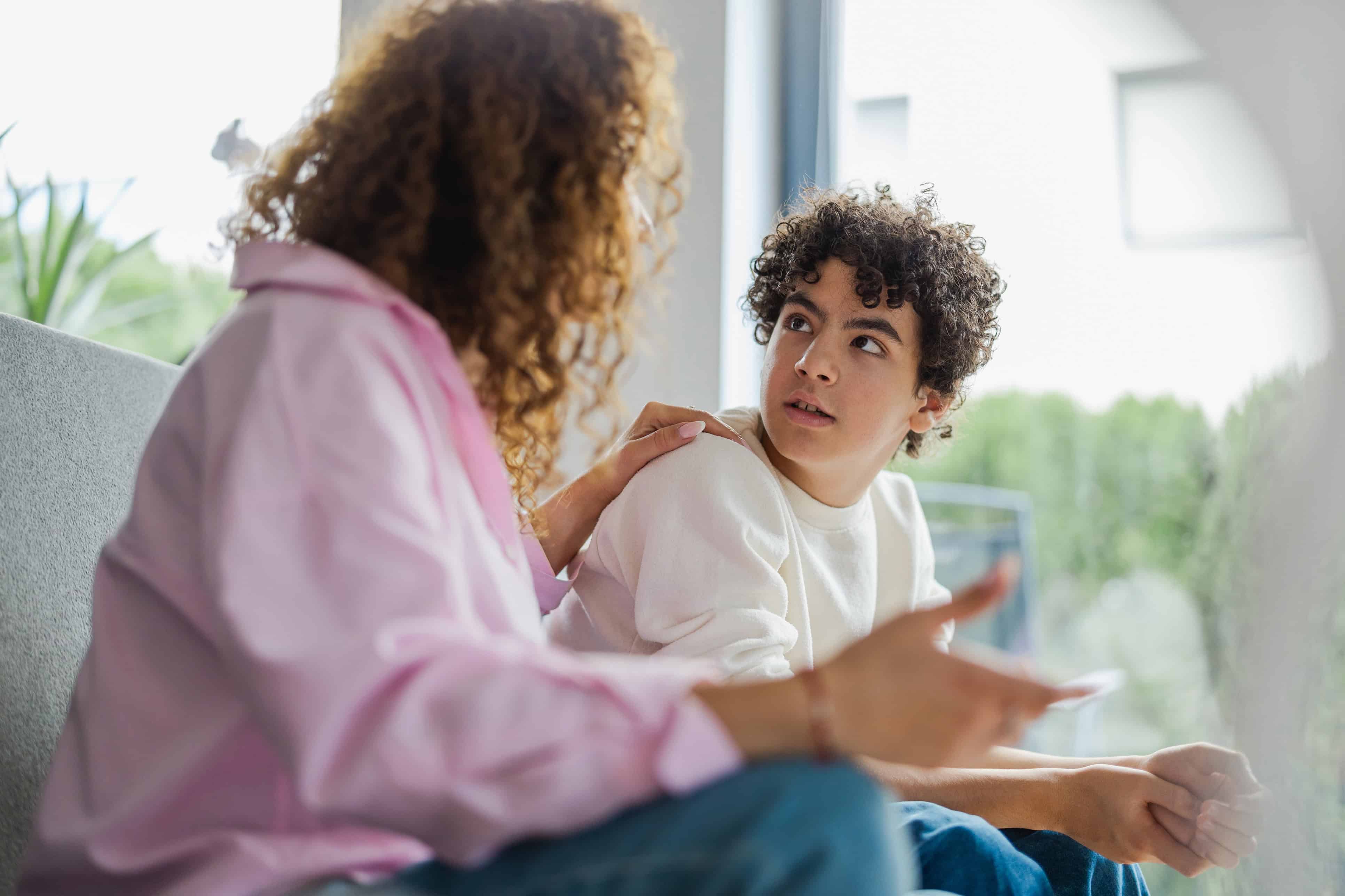 mother talking to her son 