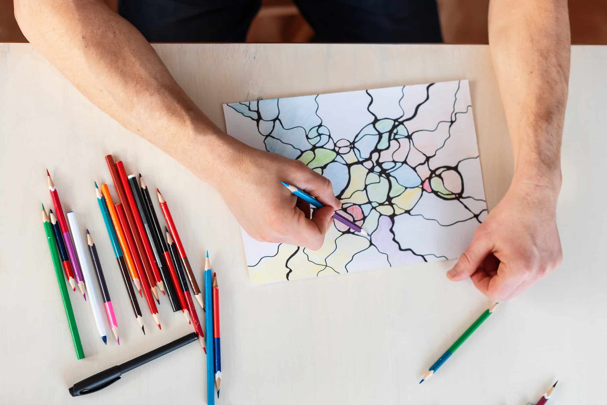 person creating neurographic art