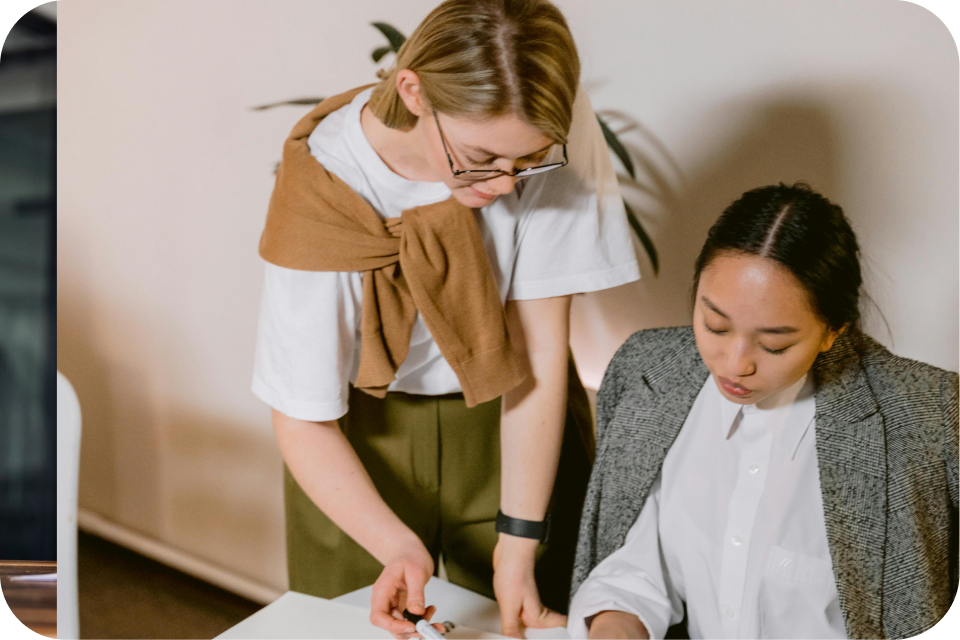 Two women in office collaborating