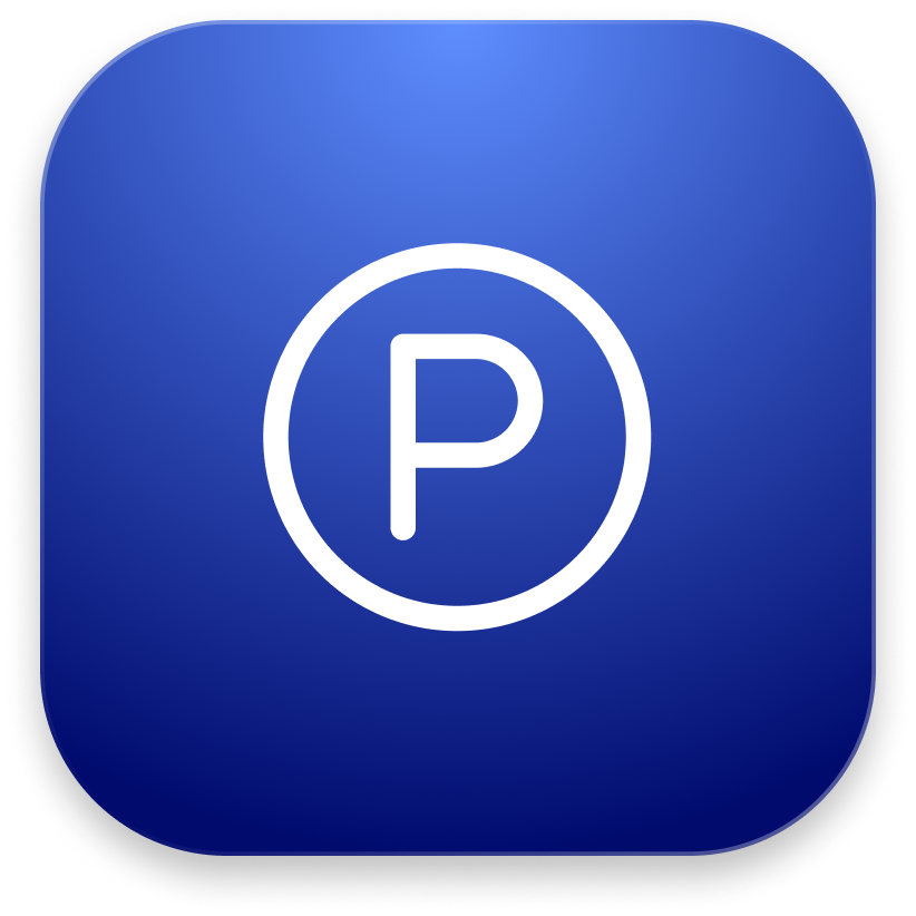 A smiling CEO sits at the computer.