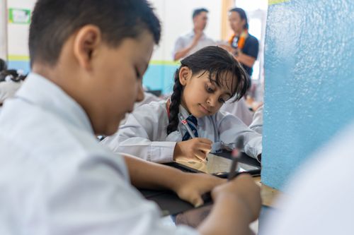 A student at Kumon Nepal learning math on a tablet.