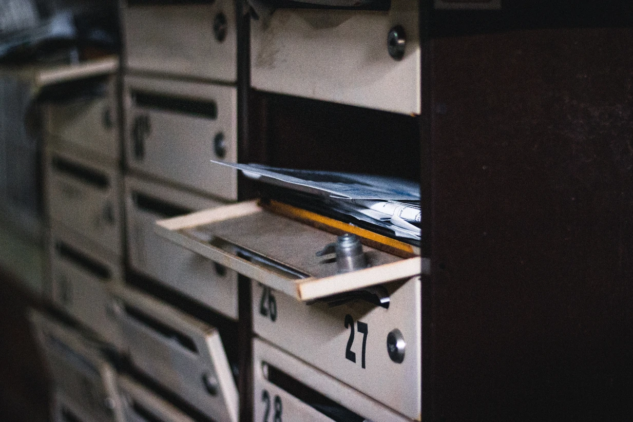 An open mailbox with letters in it