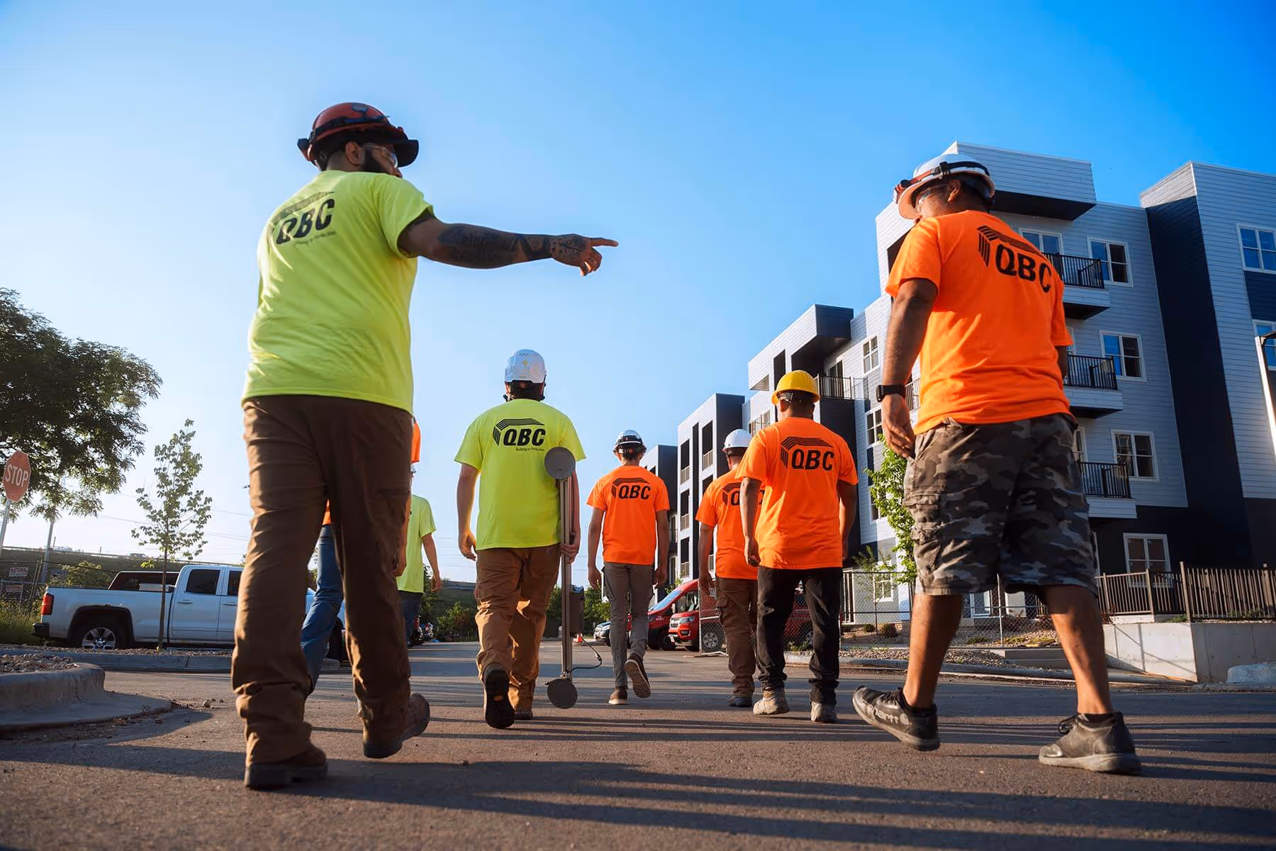 Matt Uebersetzig, owner/founder, on his cell phone with quartz slabs in background.