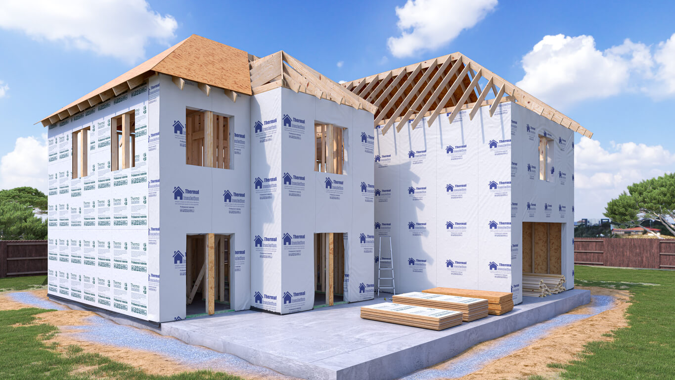 Fully framed two-story custom home with roof rafters complete