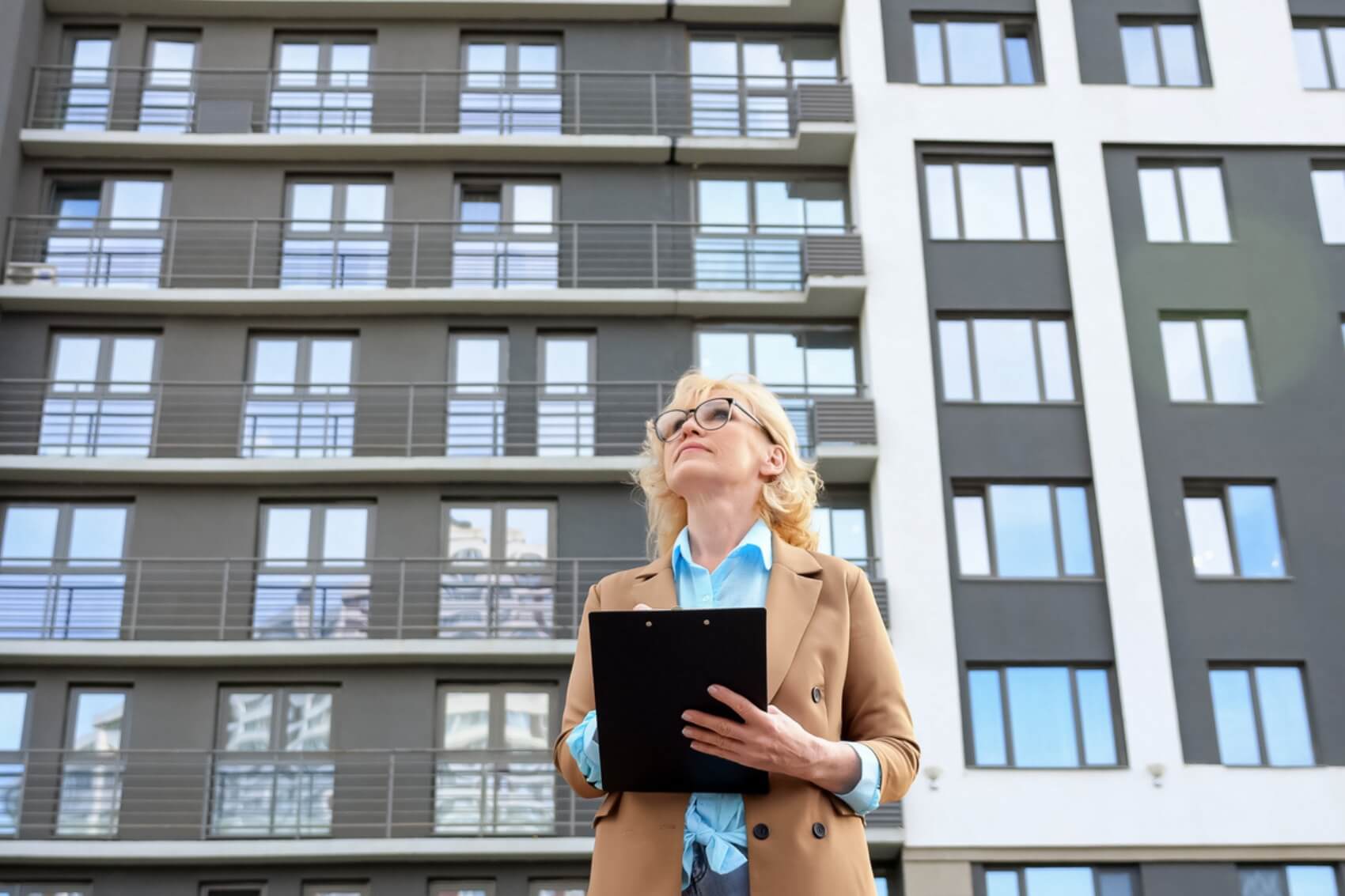 A property manager surveying the property she manages