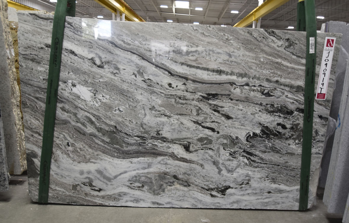 Full slab of Fantasy Brown granite with dramatic brown and gray movement, a QBC countertop package option in Wisconsin