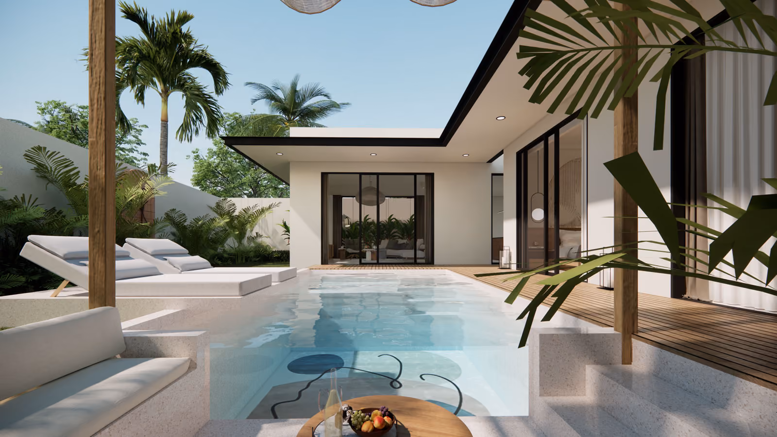 Villa outdoor space with sunken lounge, pool, sun chairs and views to the indoor spaces