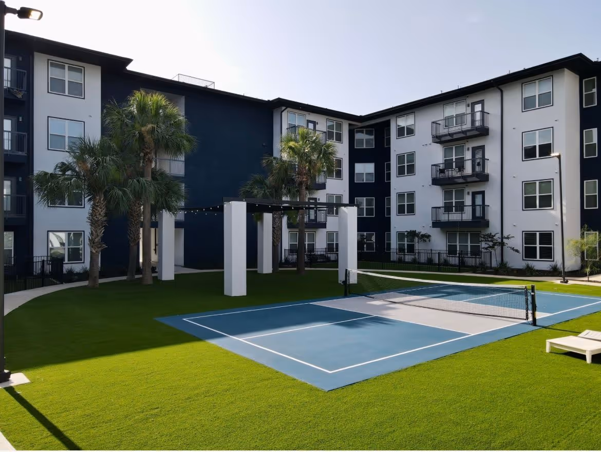 exterior with view of pickle ball court