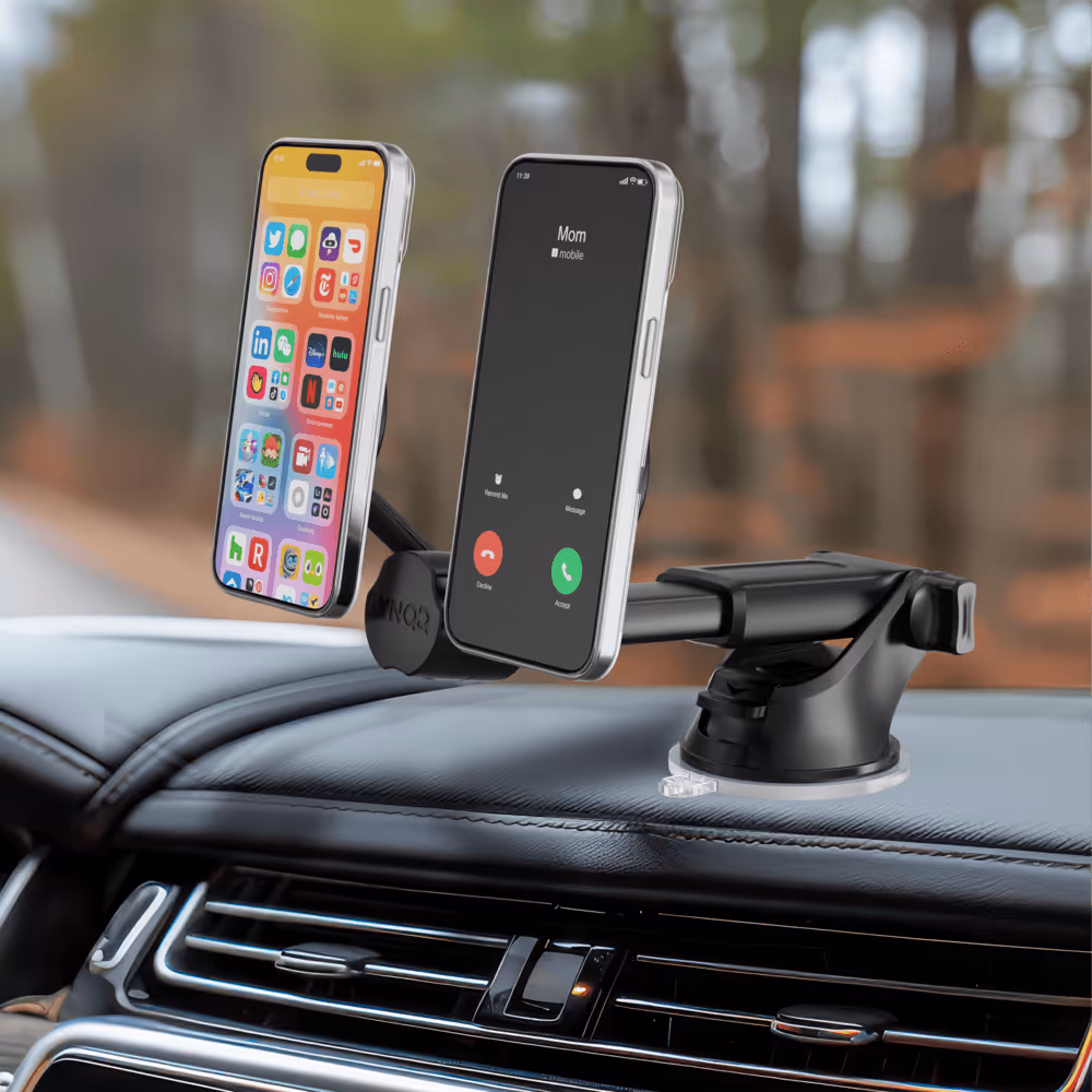 Car dashboard-mounted phone holder with two smartphones, one showing home screen apps and the other receiving a call from Mom.
