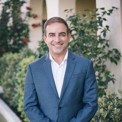 female real estate agent smiling 