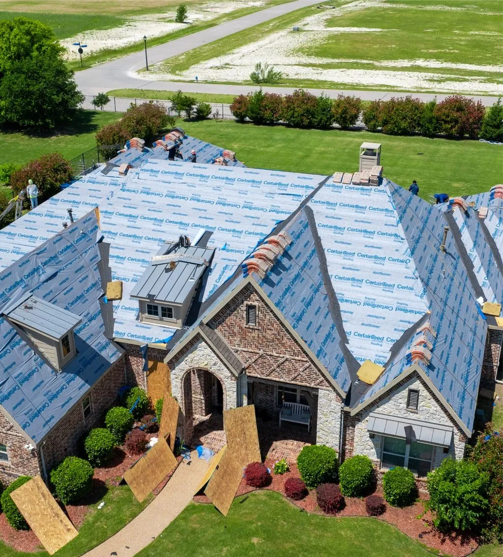 Legacy Roofing team completing final roof inspection