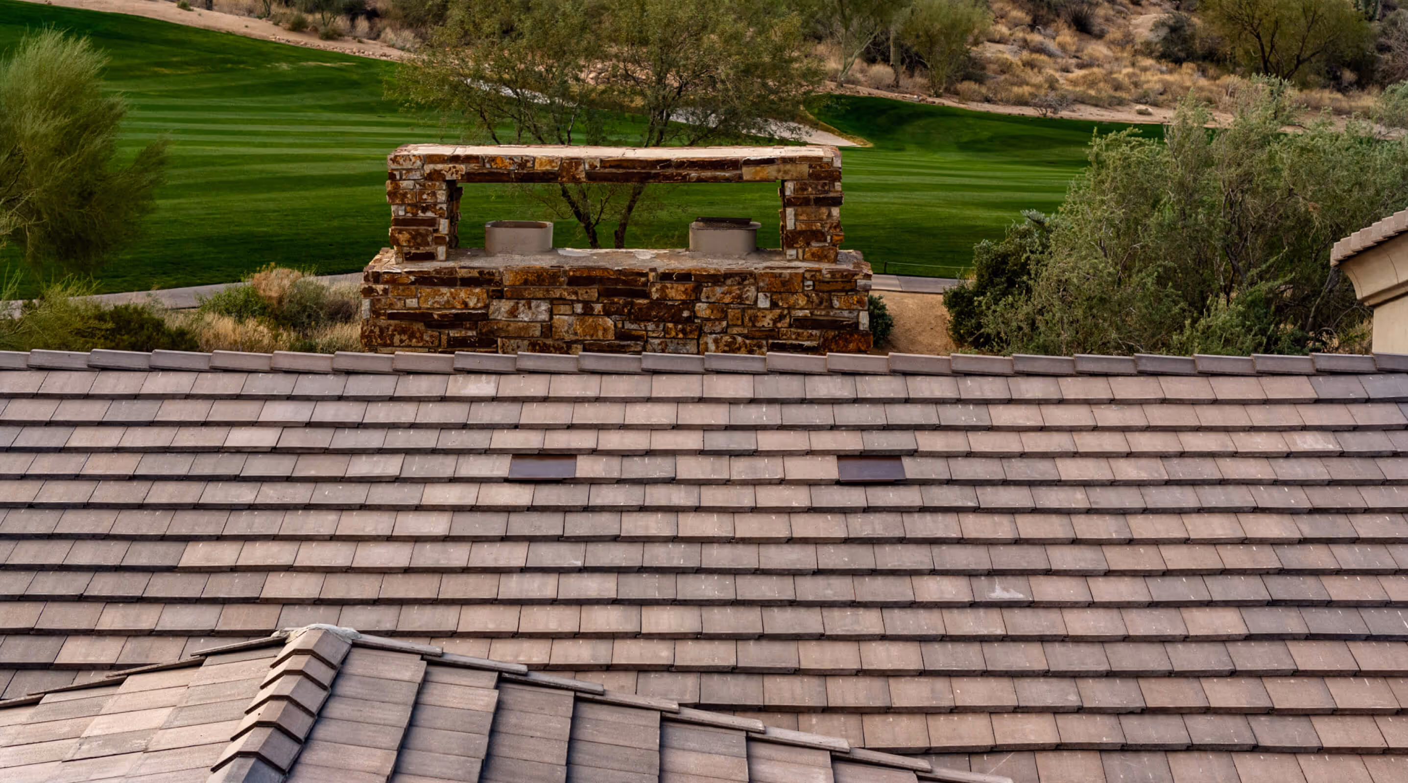 arial shot of a tile roof with Coronado Vents