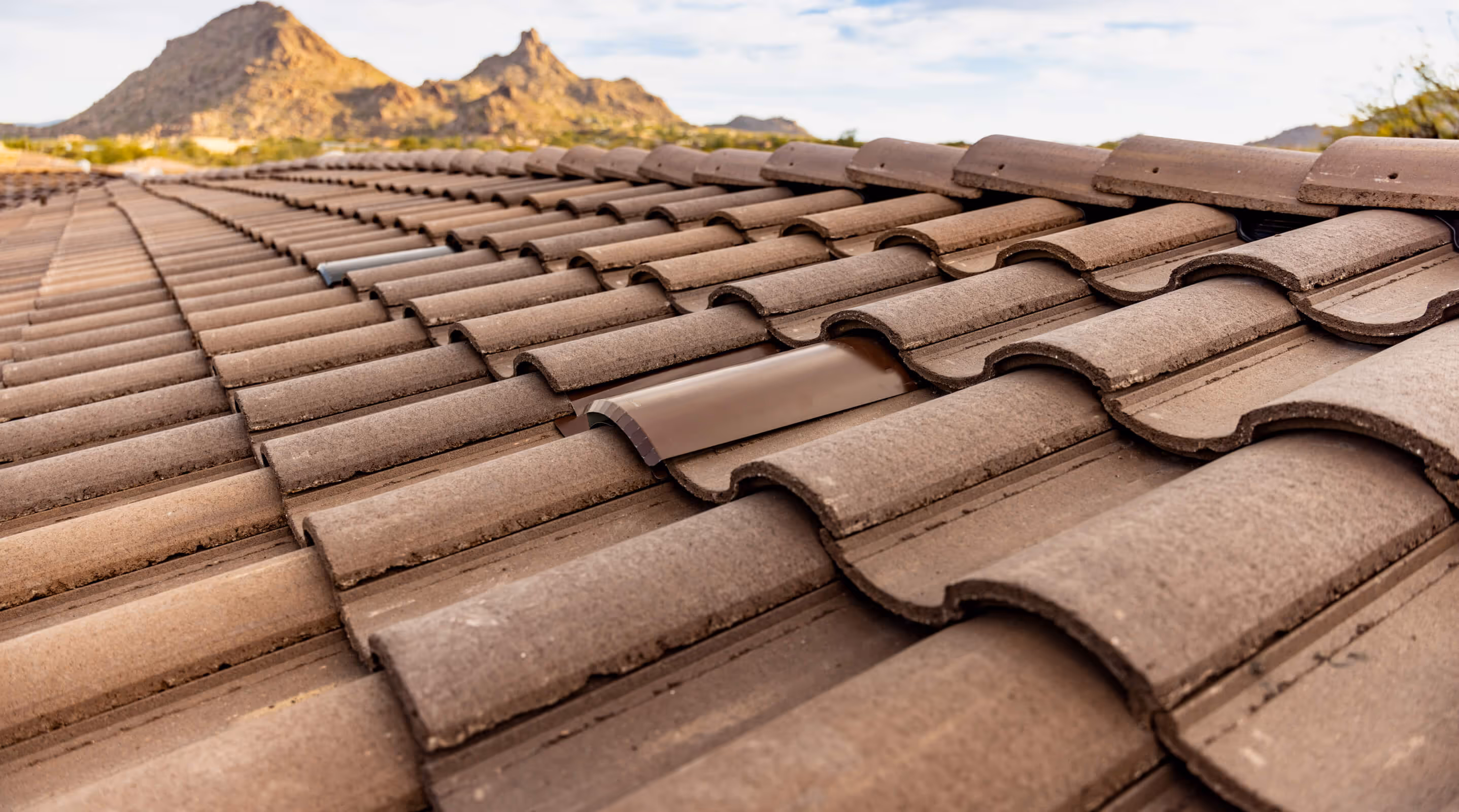 arial shot of a tile roof with Coronado Vents