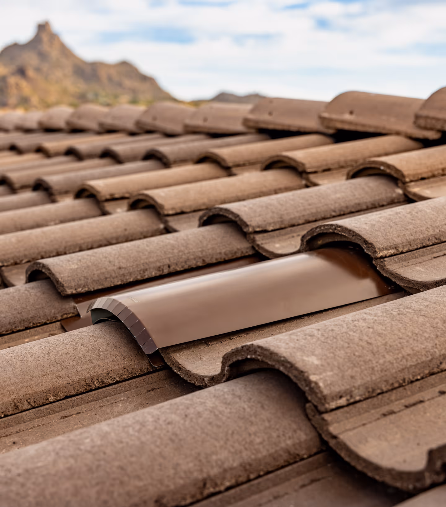 arial shot of a tile roof with Coronado Vents