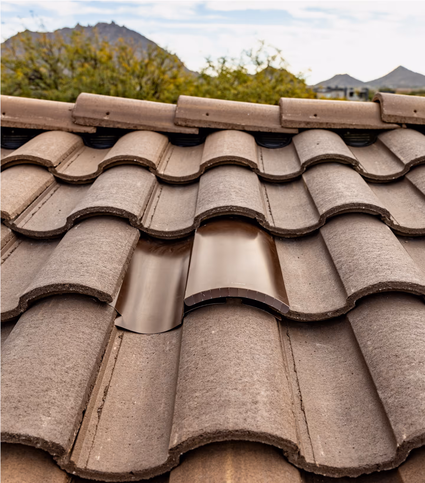 arial shot of a tile roof with Coronado Vents