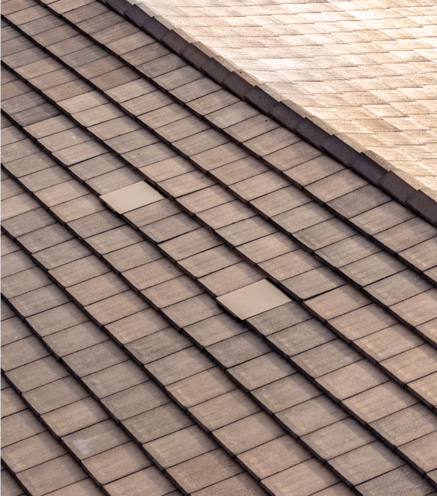 arial shot of a flat tile roof with Coronado Vents