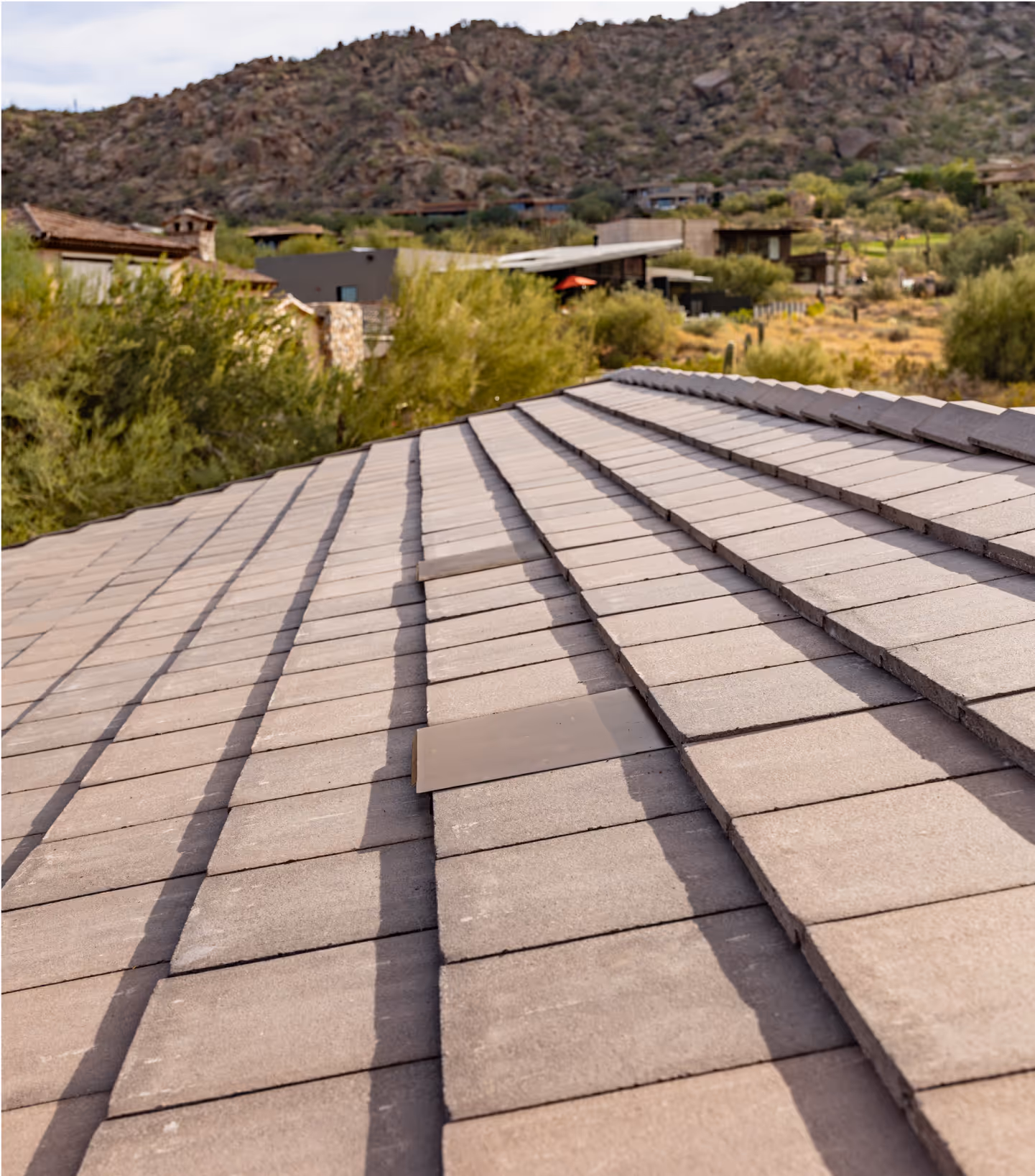 arial shot of a flat tile roof with Coronado Vents