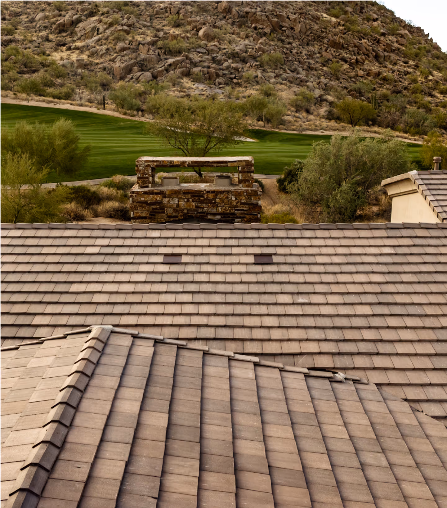 arial shot of a flat tile roof with Coronado Vents