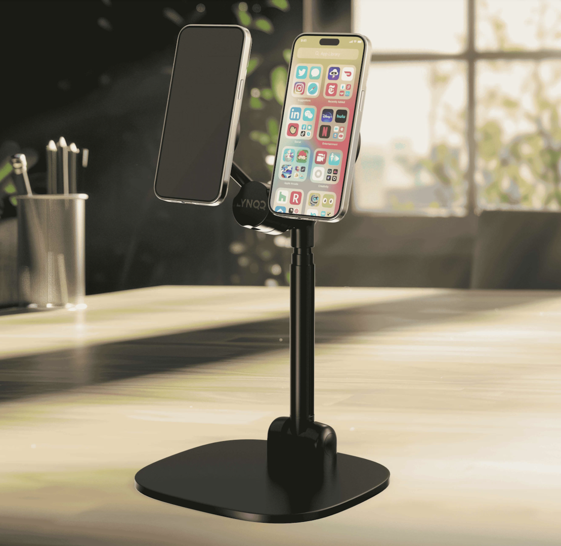 phone mount on a desk being tilted and rotated to switch between a video call and reviewing a document - adjustable phone mount phone mount on a desk being tilted and rotated to switch between a video call and reviewing a document - adjustable phone mount