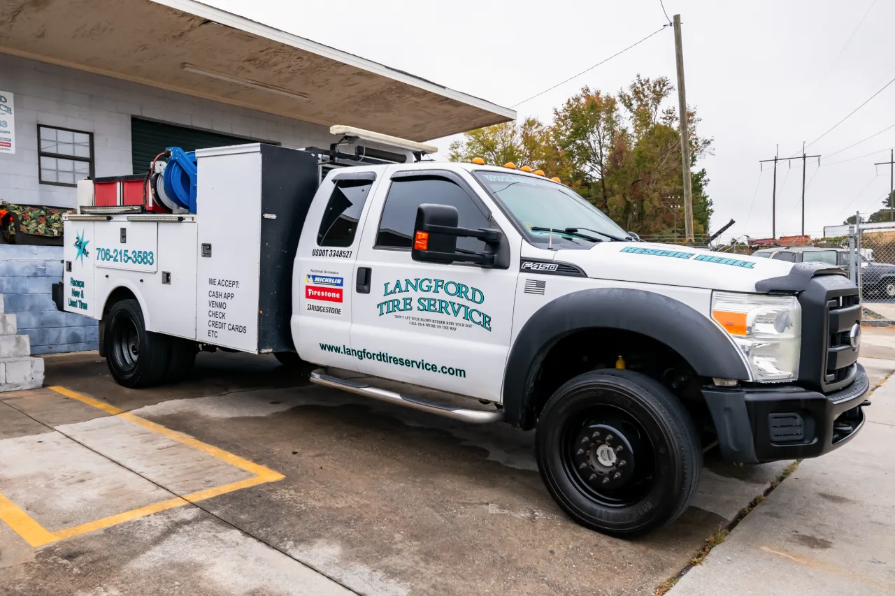 Mobile tire service truck from Langford Tire Service equipped for roadside commercial tire repairs.