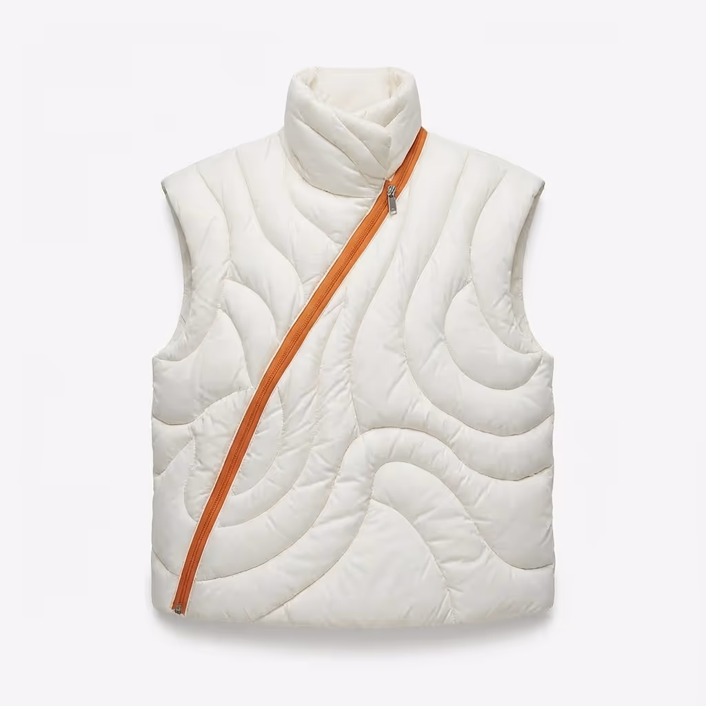 White quilted sleeveless vest with a high collar and an orange diagonal zipper. Made with The Fabricant Intelligent Tools