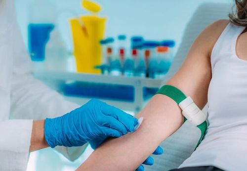 Still of a person prepping for blood draw