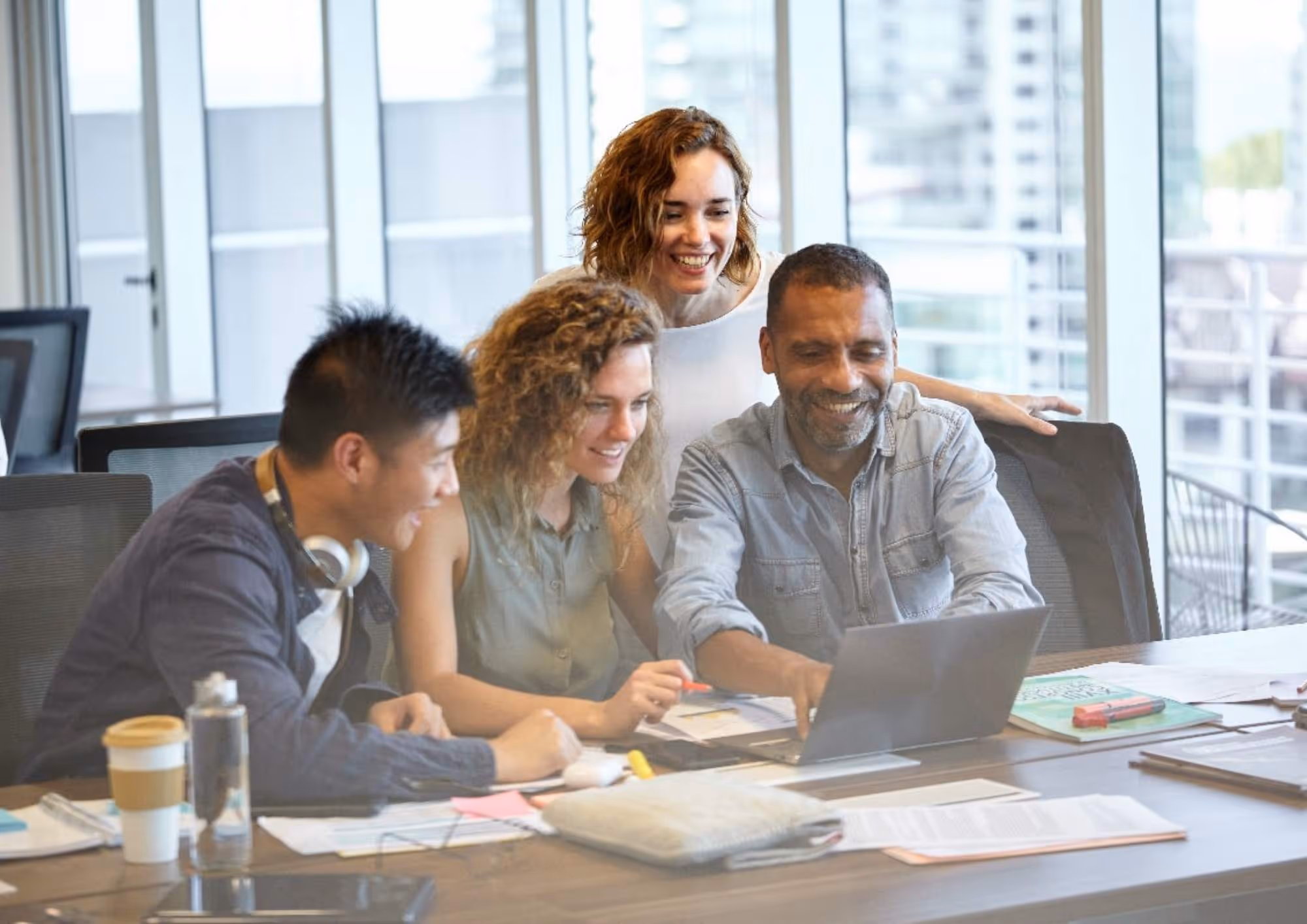 Coworkers collaborate by peer-reviewing one another.
