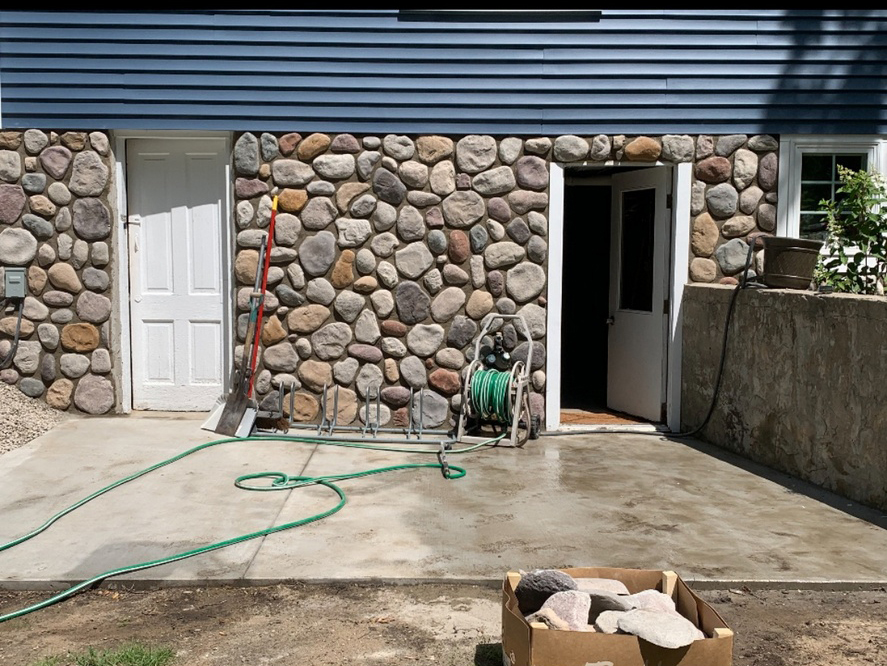 Custom round stone siding