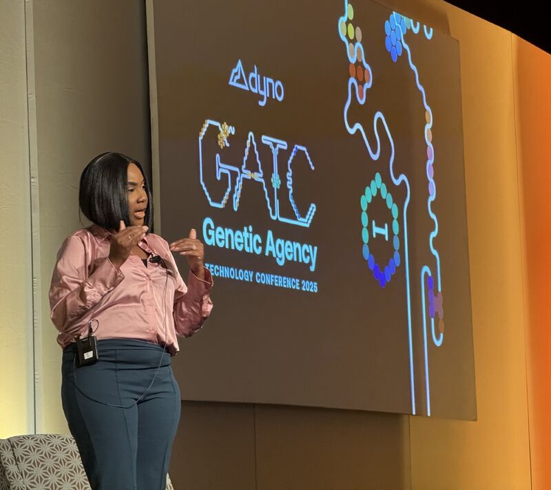 Patient advocate on stage at GATC 2025