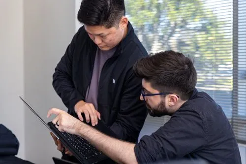A variety of Field AI robots in the company parking lot