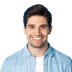 Portrait of a smiling young professional man in a denim shirt representing a sales development representative