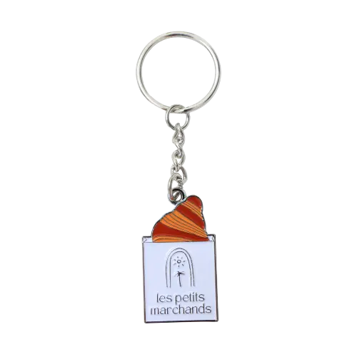 Porte clé en forme de sachet avec un croissant