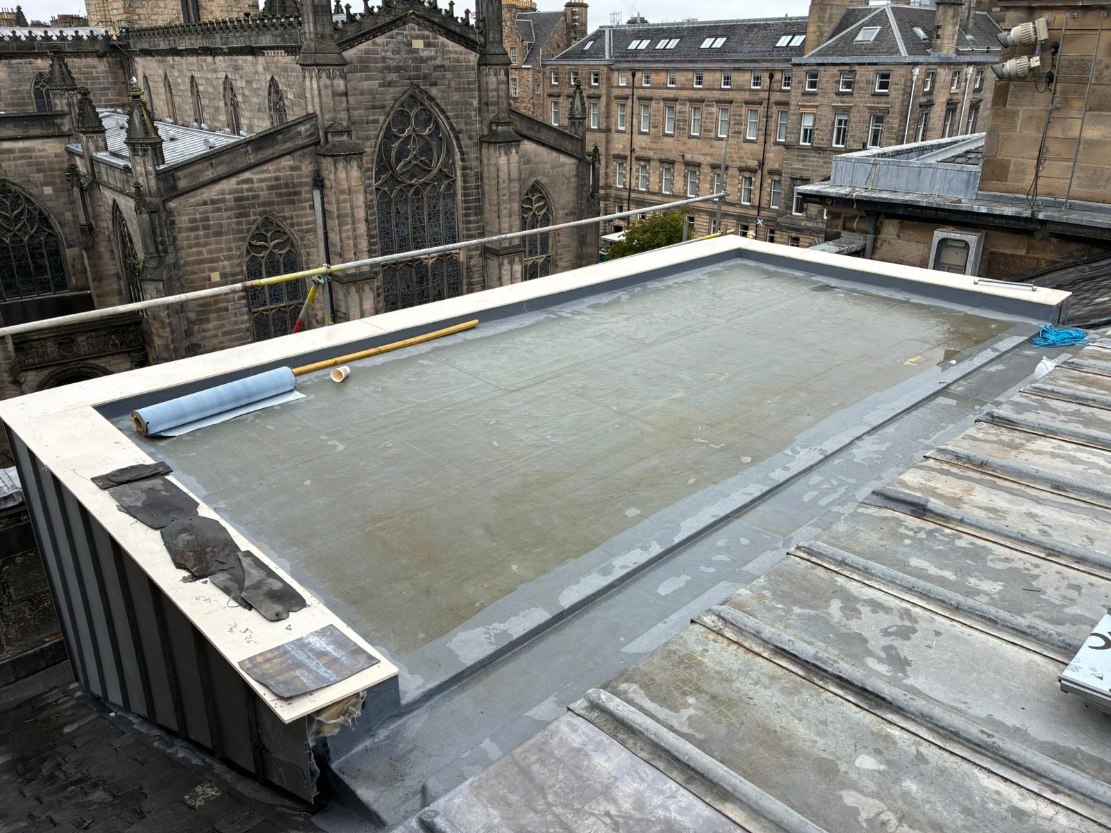 Completed insulated flat roof with VM Zinc Quartz Plus cladding installed to dormer at 1A Parliament Square, Edinburgh
