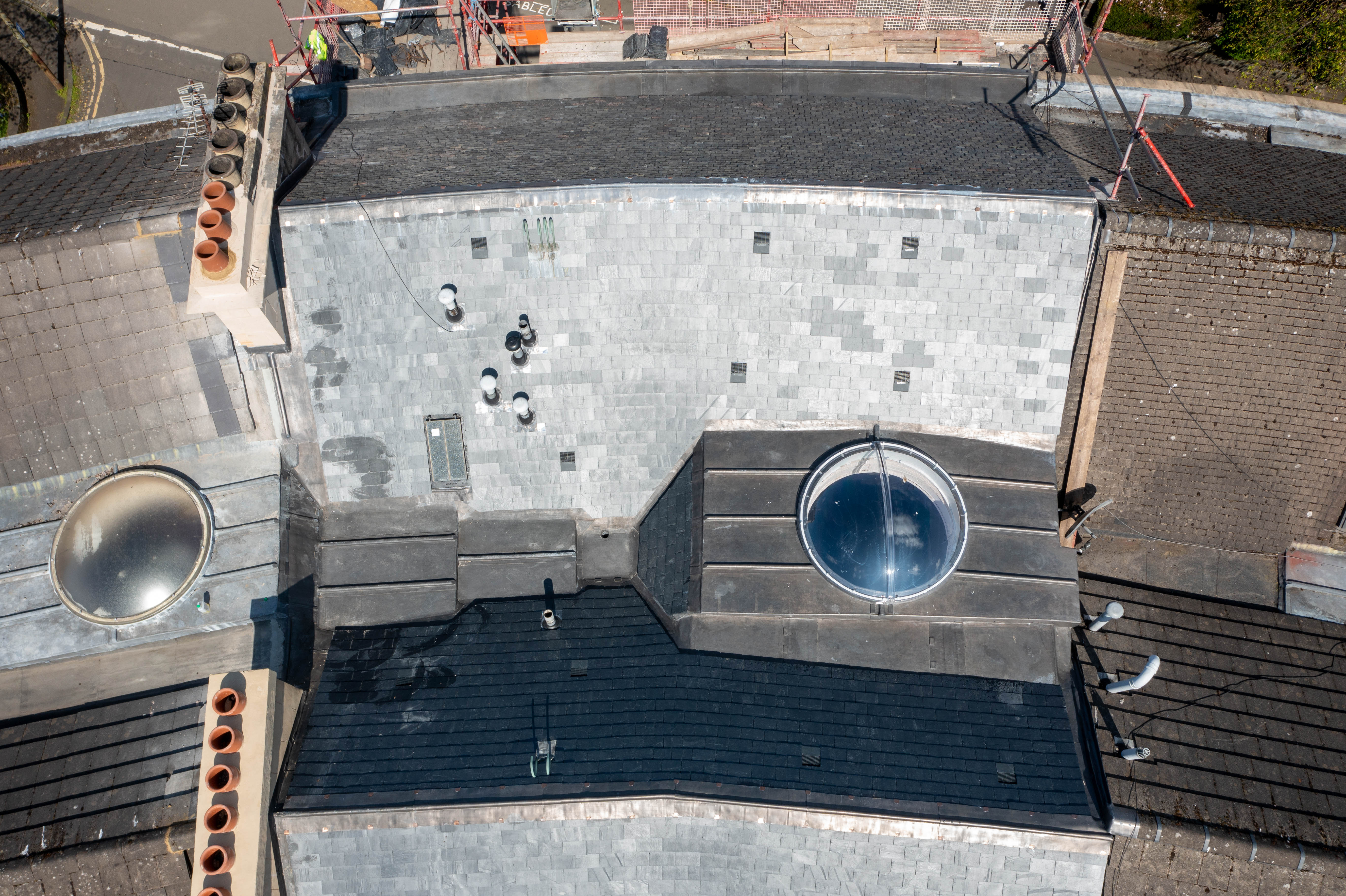 220m² CUPA H3 slate roof replacement with new flat lead roof section at a traditional Glasgow tenement on Wilton Street