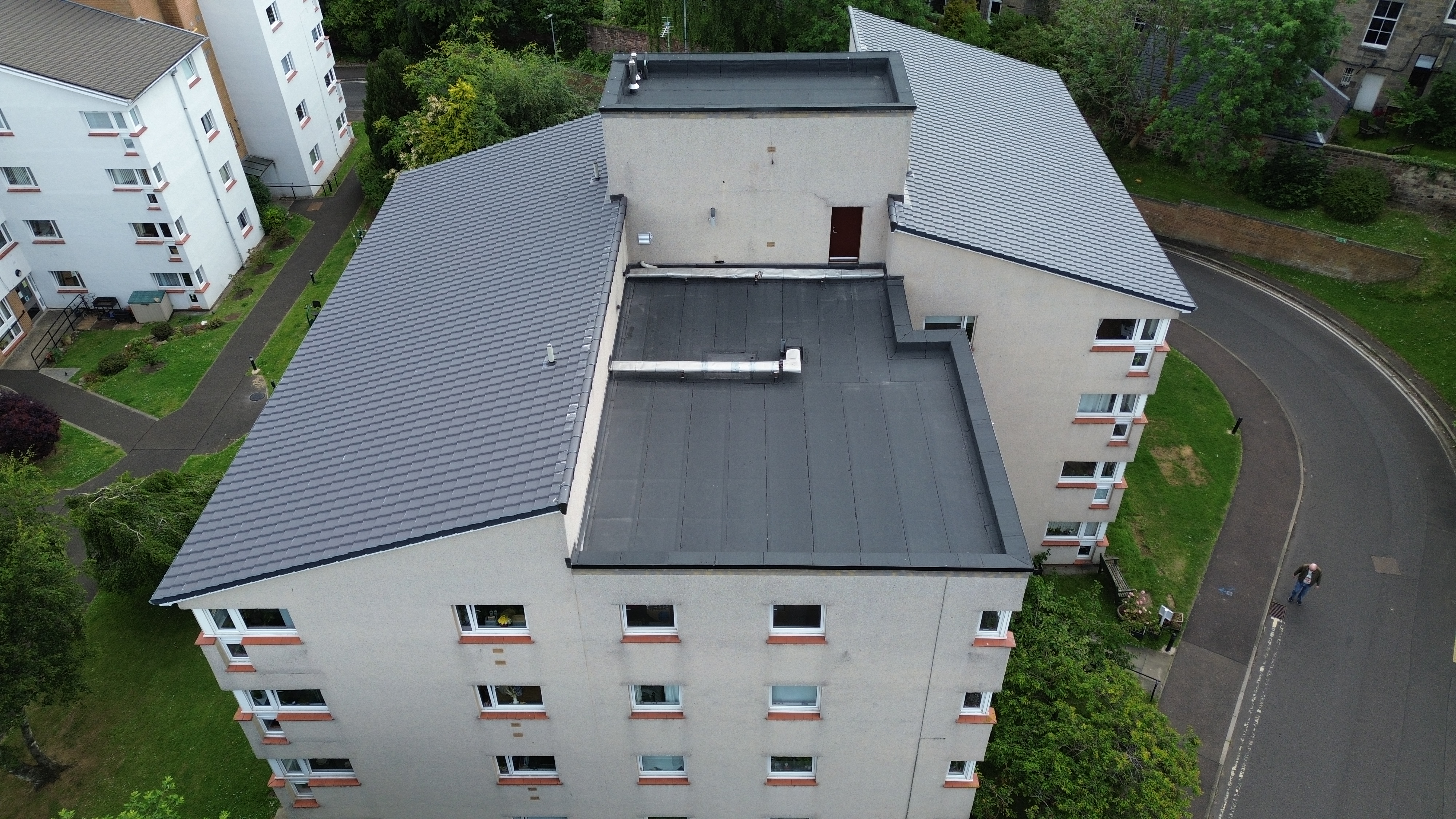 ew insulated Sika flat roofing system installed over the common stairwell at a development, Edinburgh