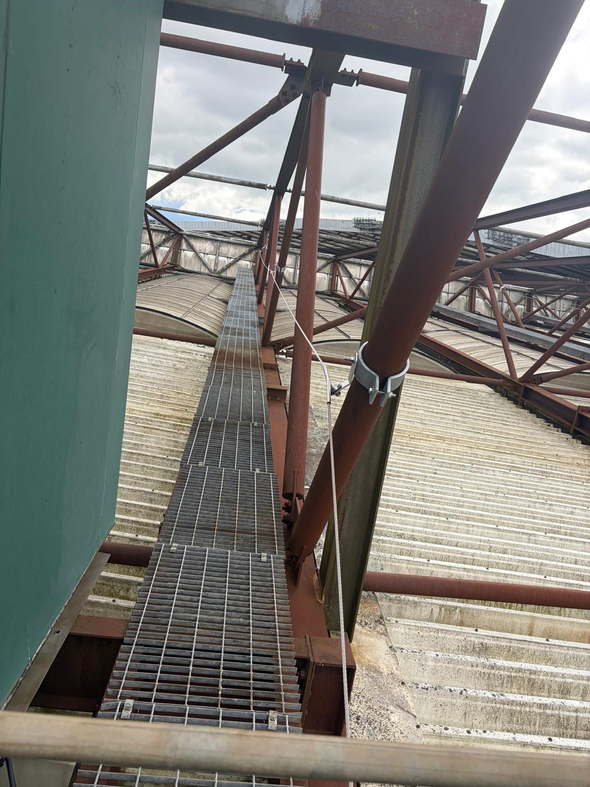 Horizontal lifeline fall protection system installed along the roof ridge at Hampden Park, providing safe access for stadium maintenance teams