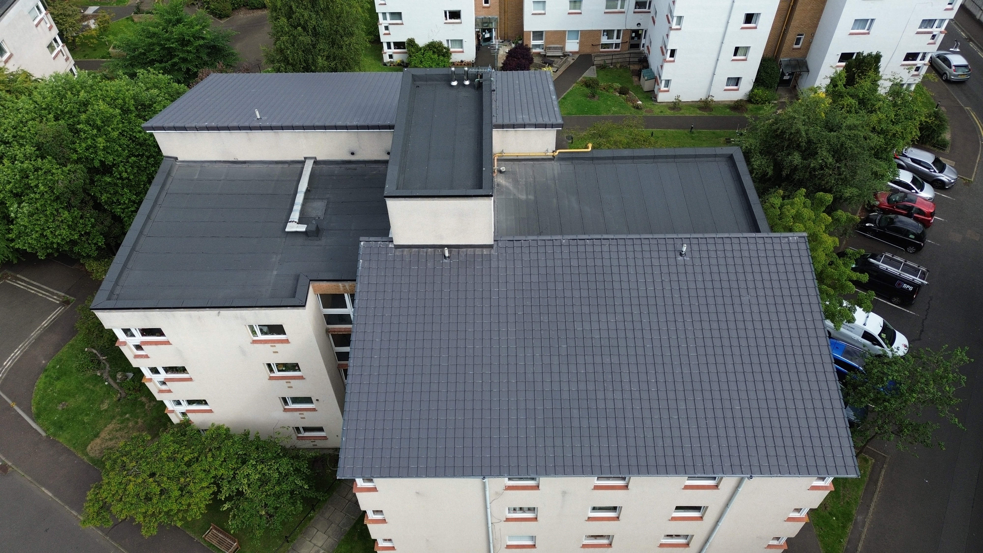 New insulated Sika flat roofing system installed over the common stairwell at a Viewpoint Housing Association development, Edinburgh