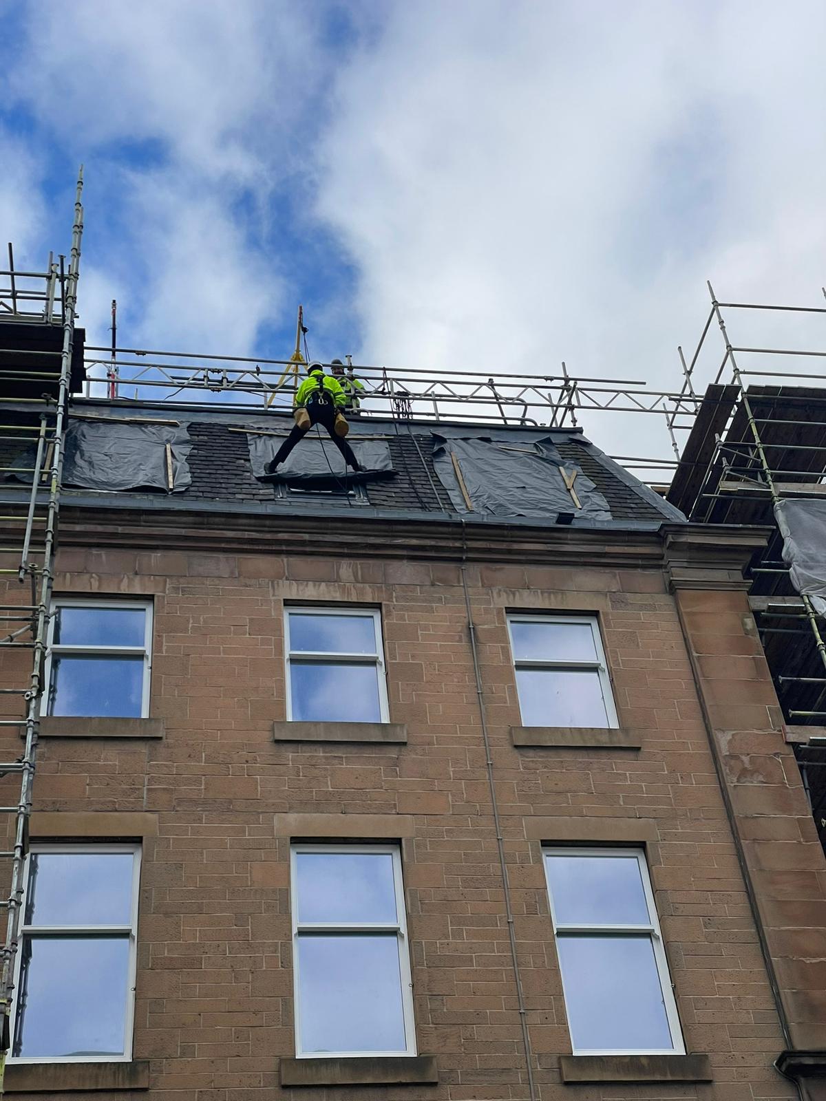 Roofing Advisors Height Services Window Replacement By Rope Access on Glasgow Student Accomodation