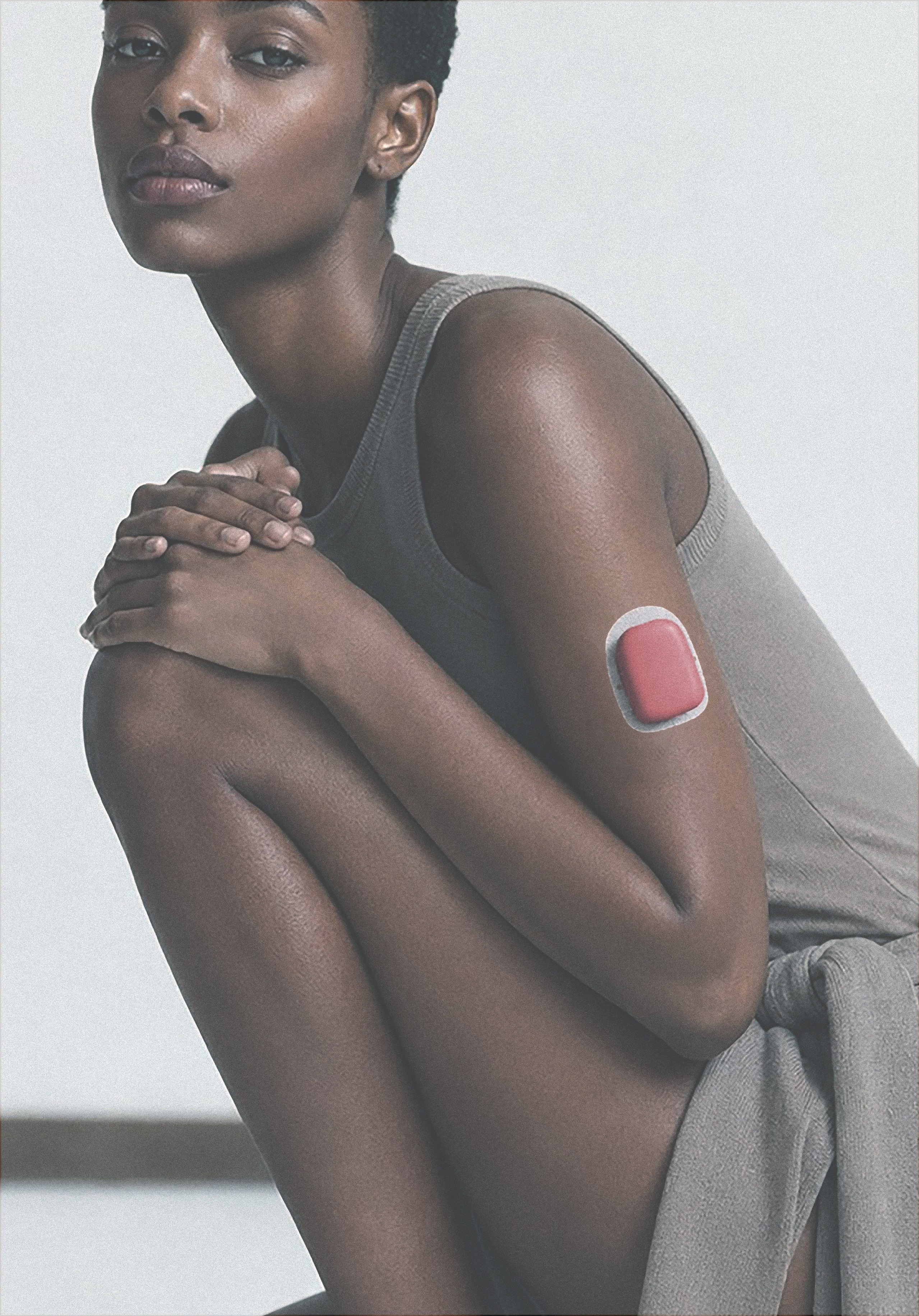 Model wearing a Mulberry PODERN pod cover