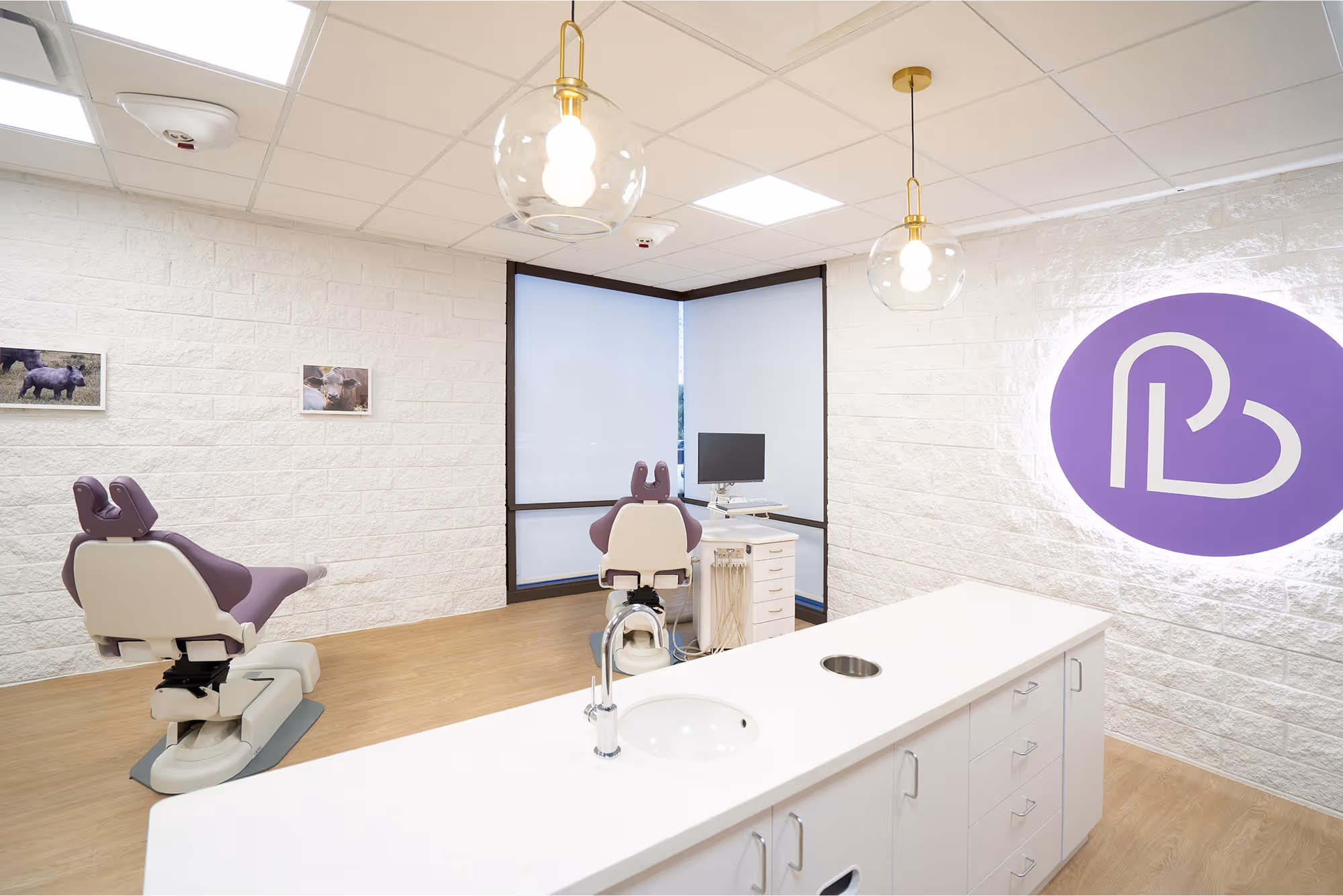 A dentist's office with a white counter top.