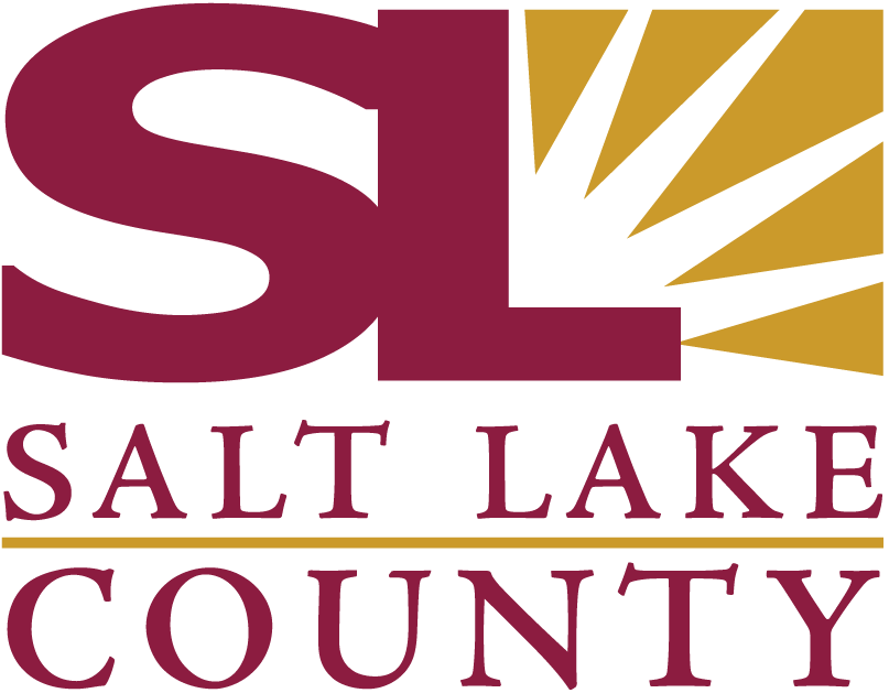Salt Lake County logo featuring large initials 'SL' with a stylized golden sunburst above the text 'Salt Lake County.'