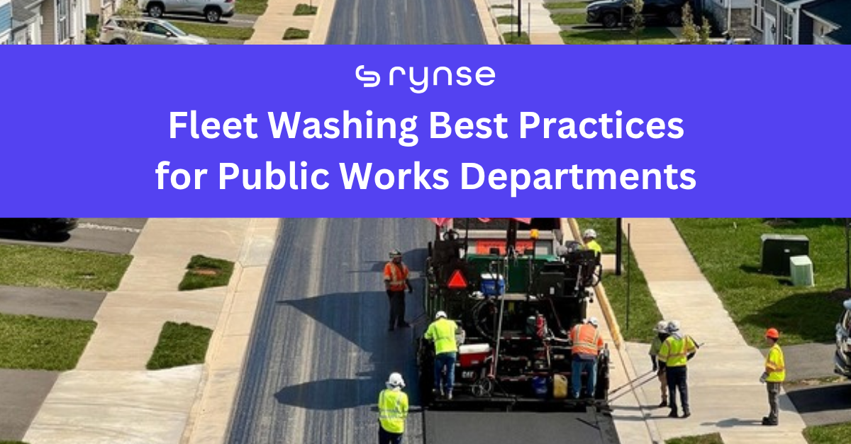 Public works crew paving a residential street on a sunny summer day