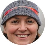 a woman's face smiling