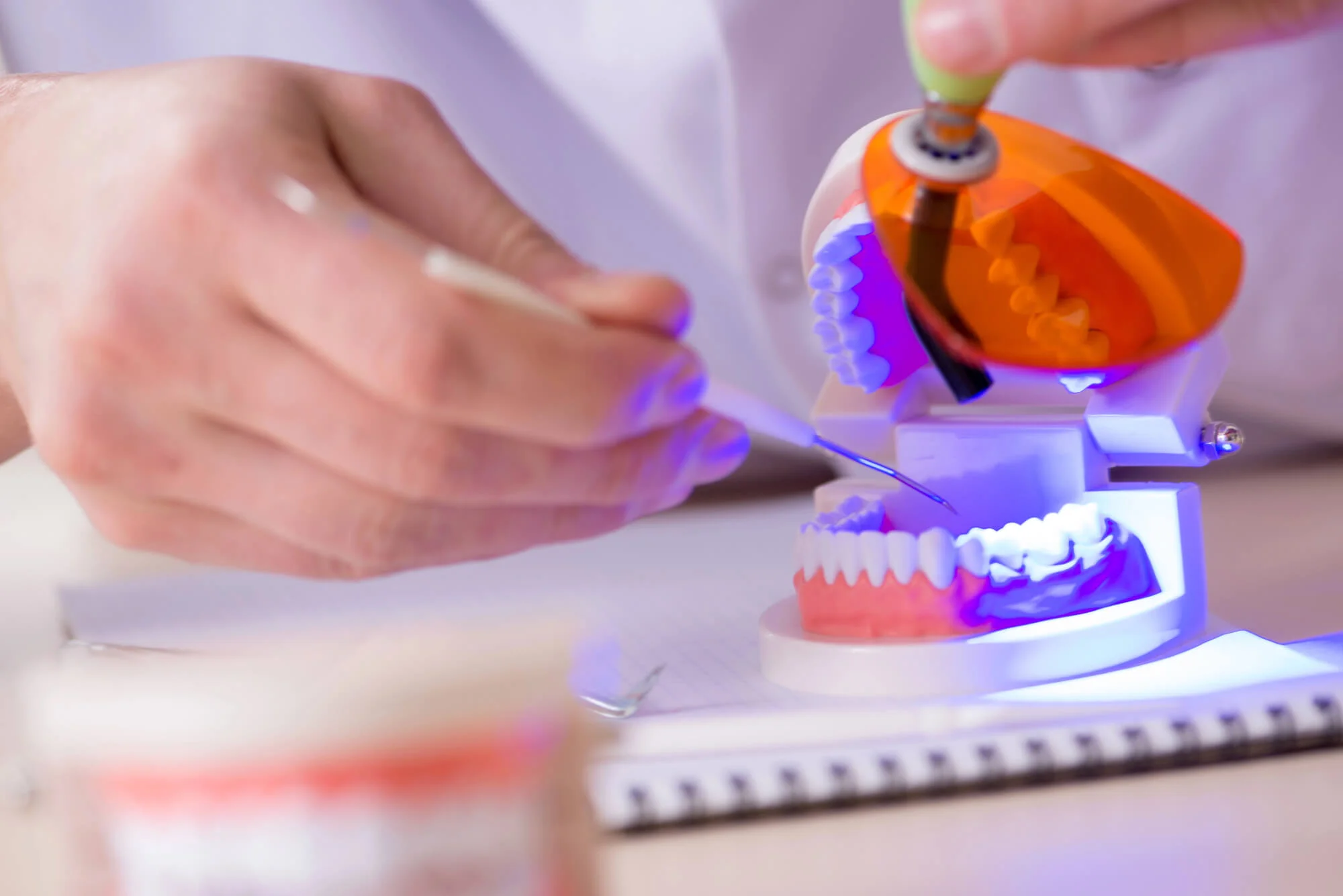 Periodontist in Fort Worth explaining gum care