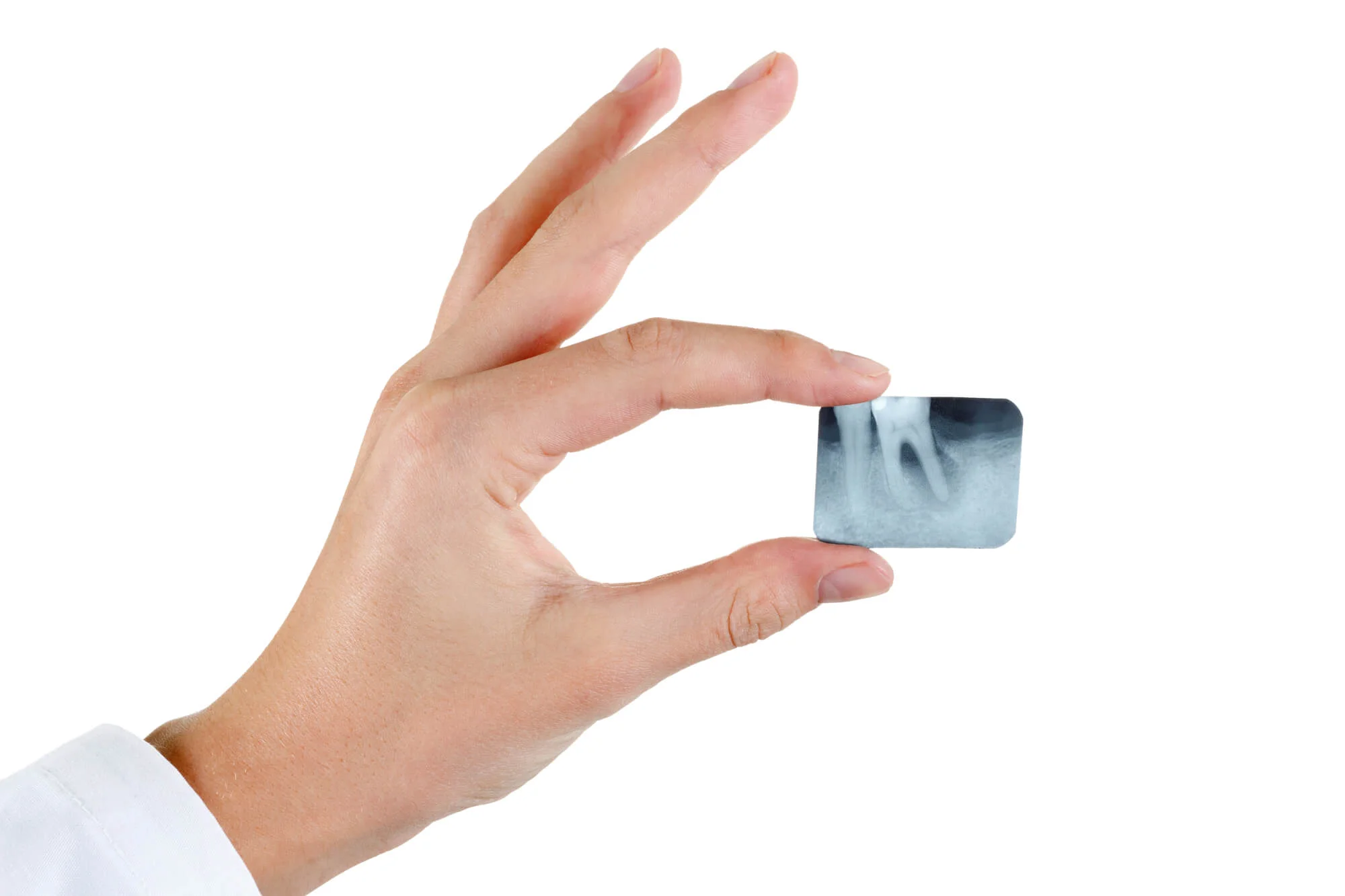 Periodontist in Fort Worth reviewing dental X-rays